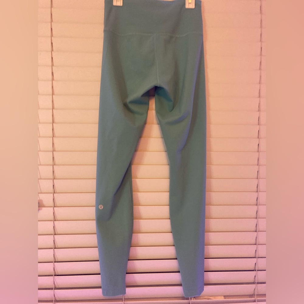 Lululemon Wunder Train High Rise Tight 28”, size 6, in the color Tidal Teal. - Picture 3 of 5